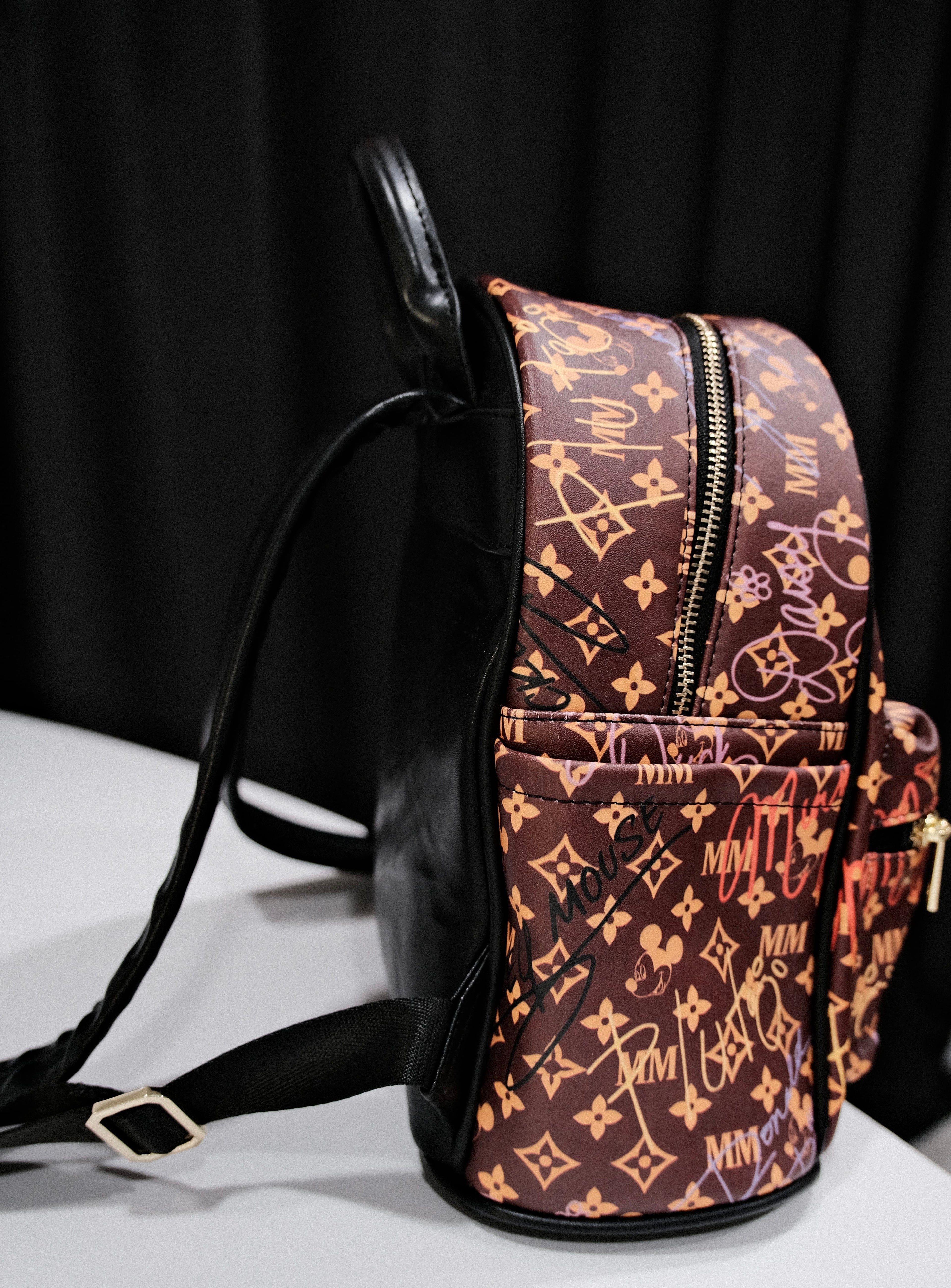 Signature Backpack